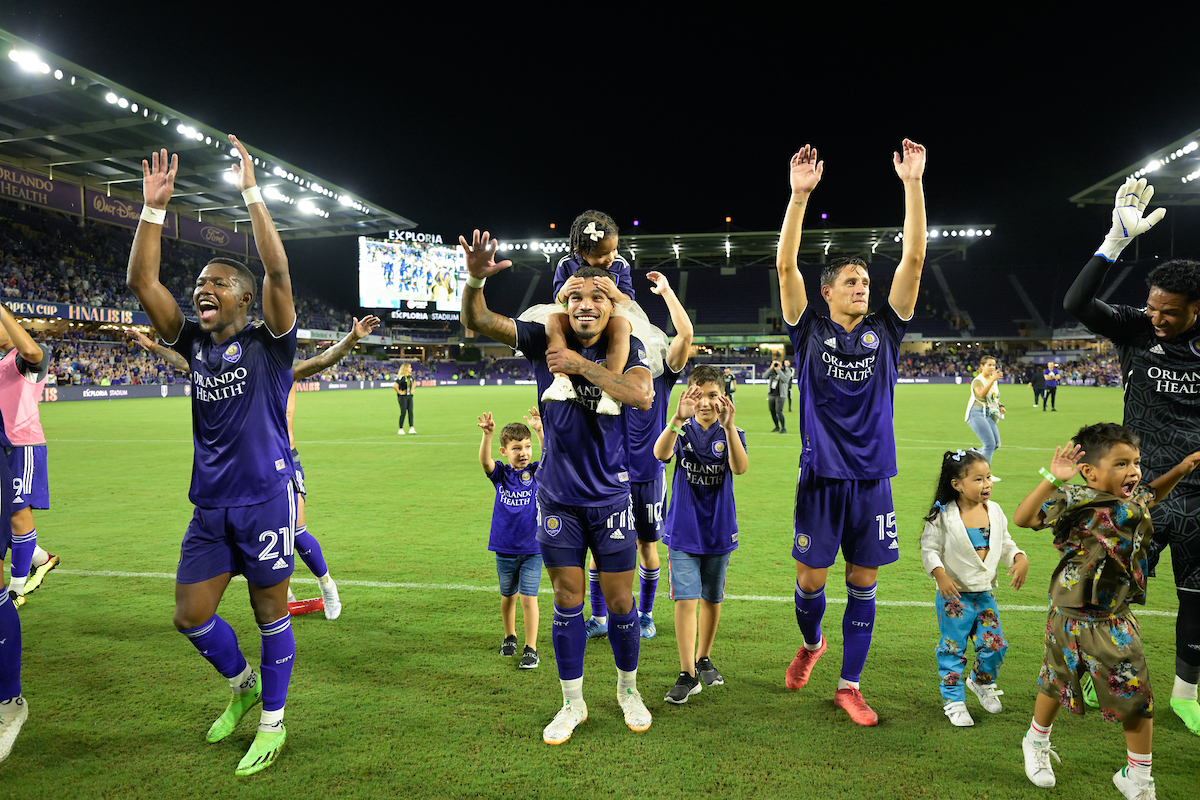 Members of Orlando City SC salute the fans after their 3-0 Lamar Hunt U.S. Open Cup victory at Exploria Stadium Wednesday, September 7, 2022. Photo: Roy K. Miller/ISI Photos